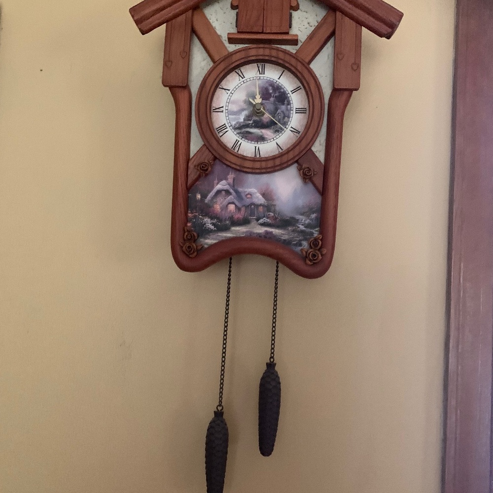 Thomas Kincaid battery operated Cuckoo Clock. Collectible